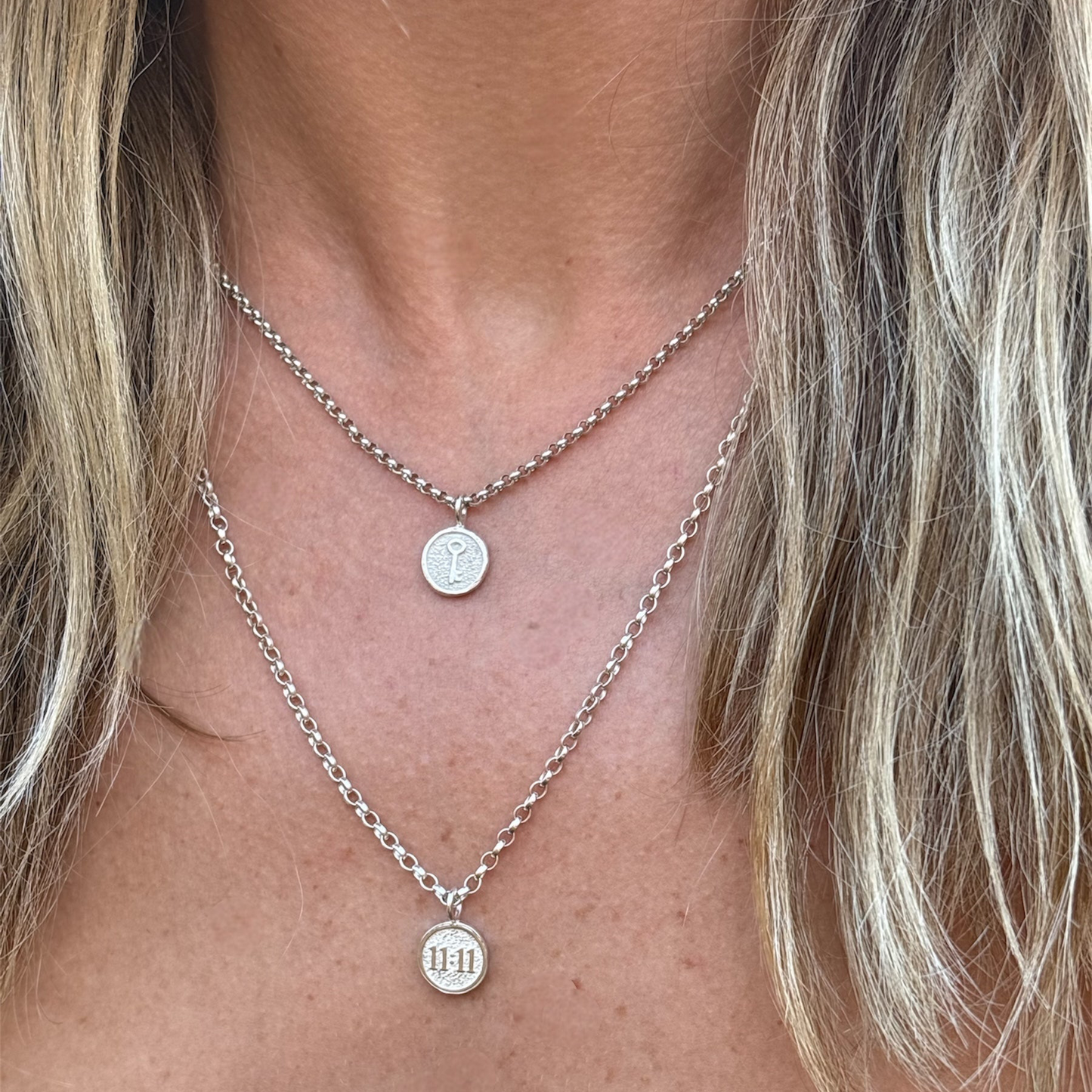 Sterling silver key charm necklace and a sterling silver 11:11 necklace