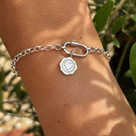 Sterling Silver Wax Seal Heart Charm on link bracelet with oval clasp – Theodore & Olive Jewellery.