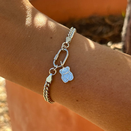 Silver curb chain bracelet with silver teddy bear charm