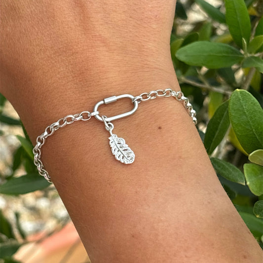 Silver belcher chain bracelet with silver feather charm