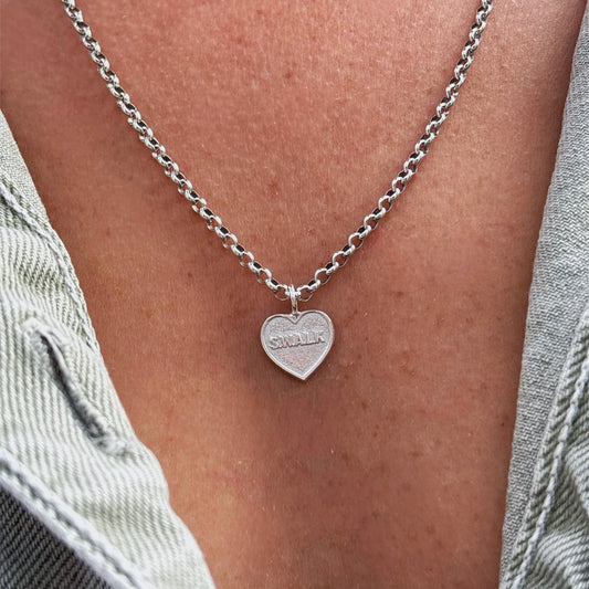 Sealed with a loving kiss charm necklace in sterling silver